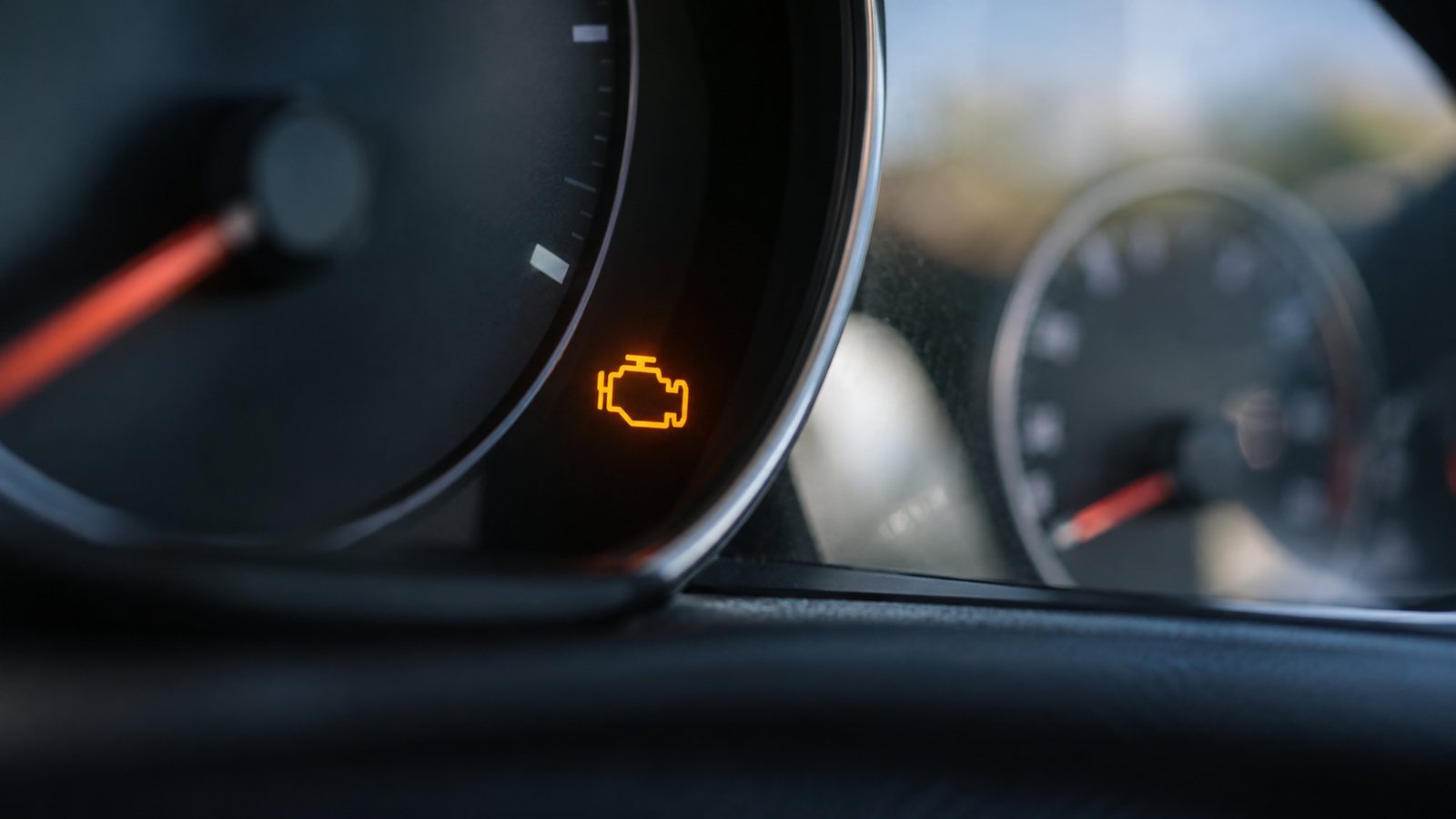 Dashboard with a check engine light (illustrative)
